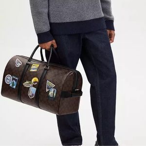 Coach Venturer Bag in Signature Canvas With Travel Patches Brand New With Tags